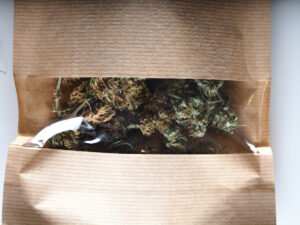 dry flowers medical marijuana in paper bag market package